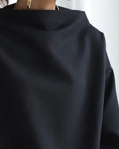 ELLY | Top suave de cuello alto